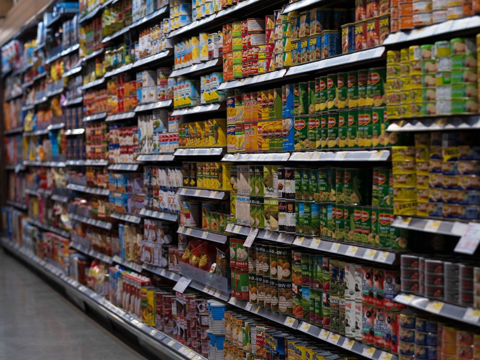 Well-stocked retail shelf of FMCG products